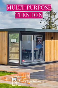 a small wooden building with the words multi purpose teen den