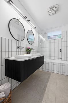 Bathroom Mirror Backsplash with Subway Tile Backsplash for Eclectic Bathroom Design
Subway tiles seem to be having a moment, looking much more fashionable and modern, especially when they are vertically stacked as showcased by this eclectic bathroom design. Mirror Tile Backsplash, Modern Tile Backsplash, Eclectic Bathroom Design, Tile Backsplash Bathroom, Blue Bathroom Tile, Vista House, Grey Subway Tiles, Timber Vanity, Black White Bathrooms