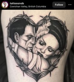 a couple in the shape of a heart with barbed wire around them on top of each other