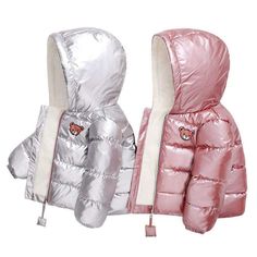 Keep your kids toasty warm and look stylish in a shimmering metallic style winter hooded padded jacket. Featuring hood and closure zip on the front. It is made from thick and soft fabric which is perfect for winters. A hooded puffer jacket to keep your little cozy and warm from breezy days. Influencer@fashionista_estelle Influencer @fashionista_estelle Influencer @nojanars_ Style: Fashion Material: COTTON Material: Cashmere Material: MICROFIBER Metallic Style, Cropped Puffer Jacket, Hooded Puffer Jacket, Baby Outerwear, Baby Jacket, Style Winter, Fashion Materials, Look Stylish, Metal Style