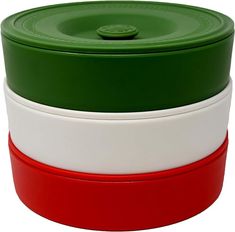 three different colored bowls stacked on top of each other with one green and the other red