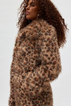 Silence + Noise coat in an allover cheetah faux fur we’re wild for. Designed in an oversized jacket fit featuring an exaggerated collar neckline, hand pockets and a button up front. Only at Urban Outfitters. Features Silence + Noise Stacey cheetah faux fur overcoat Animal print jacket Cheetah print faux fur Oversized collar neckline and long sleeves Button-up jacket with front pockets Boxy, oversized fit Longline length Lined Button closure UO exclusive Content + Care 100% Polyester; lining 100% polyester Machine wash Imported Size + Fit Model in Brown is 5’11" and wearing size Small Measurements taken from size Medium Length: 27" | Silence + Noise Stacey Cheetah Faux Fur Overcoat Jacket in Brown, Women's at Urban Outfitters Fall Leopard Print Fur Coat With Faux Fur Lining, Leopard Print Faux Fur Coat With Lining, Leopard Print Outerwear With Faux Fur Trim, Fall Leopard Print Faux Fur Coat, Leopard Print Fur Coat With Faux Fur Trim, Winter Leopard Print Faux Fur Outerwear, Winter Leopard Print Outerwear With Faux Fur Trim, Fall Leopard Print Outerwear With Faux Fur Trim, Leopard Print Faux Fur Coat