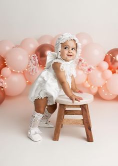 Presenting our enchanting White Satin Ceremony Butterfly Bonnet for kids, a delightful accessory that will make your little one shine on those memorable ceremonies and special events. This bonnet is crafted with love and care, using the finest materials to ensure both style and comfort for your child. The bonnet features a soft white satin base, adorned with intricate smock and delicate tulle, creating a beautifully textured and elegant look. What truly sets this bonnet apart are the exquisite h