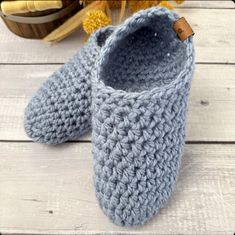 "Keep your toes toasty warm with these warm cozy knit handmade slippers. Crocheted from a thick soft yarn, they are sure to be the coziest slippers your feet have ever been in.  Slippers are gender neutral and are a perfect gift for yourself or someone in your life who needs some extra cozy comfort. They are great for wearing at home or for packing in your bag to bring along when visiting friends or family.  These cozy indoor slipper socks are super stretchy and won't cause constriction of your feet but will keep their shape as well.    ITEM DETAILS:   * Handmade with a soft bulky acrylic yarn which is a great option to wool slipper * Available in 20 colours  * Option of 4 different size  * Handcrafted in a hygienic enviorment at my cozy farm in small town Saskatchewan  * Fully washable fo Cozy Crochet Slippers For Winter, Handmade Cozy Yarn Slippers, Cozy Handmade Winter Slippers, Handmade Yarn Slippers For Winter, Casual Crochet Slippers For Winter, Casual Crochet Winter Slippers, Cozy Yarn Slippers With Round Toe, Comfortable Crochet Yarn Slippers, Cozy Knitted Yarn Slippers