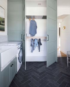 a washer and dryer in a small room