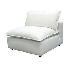 a white chaise lounger with pillows on it's back and bottom part