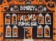 an orange and black halloween drawing book