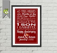 a red and white poster hanging on a brick wall next to an apple with the words 40 years married