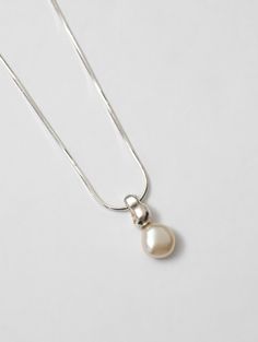 Wolf Circus Timeless Pearl Pendant Necklace in 925 Sterling Silver | Emmy Necklace in Sterling Silver Wolf Circus, Silver Snake Chain, Demi Fine Jewelry, White Freshwater Pearl, Charm Rings, Pearl Pendant Necklace, Sterling Silver Necklace, Snake Chain, Pearl Pendant