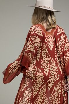 Damask, ruggine mini pom pom and split angel sleeves kimono Bohemian Kimono With Kimono Sleeves For Festive Occasions, Red Bohemian Tunic Kimono, Bohemian Brown Kimono For Fall, Bohemian Long Sleeve Brown Kimono, Bohemian Brown Long Sleeve Kimono, Red Kimono With Kimono Sleeves For Festival, Fall Kaftan With Kimono Sleeves, Brown Kimono With Kimono Sleeves For Fall, Fall Festival Kaftan With Kimono Sleeves