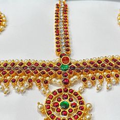 Classical Dance Jewelry Multicolor Temple Jewelry Sets With Tilla, Multicolor Temple Jewelry Sets For Puja, Multicolor Temple Jewelry Tikka For Puja, Temple Jewelry Sets For Puja Festivals, Multicolor Navratri Temple Jewelry Sets, Temple Jewelry Sets With Tilla For Puja, Temple Jewelry Sets For Festivals And Puja, Temple Jewelry Sets With Stone Work For Festivals, Bollywood Style Sets With Tilla For Puja