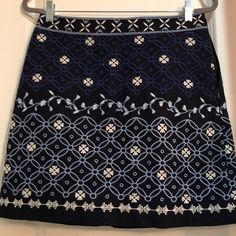 Very Pretty Skirt Navy Blue With Lighter Blues And White Embroidery. In Excellent Condition Never Worn. Blue Embroidered Mini Skirt, Fitted Blue Skirt With Floral Embroidery, Embroidered Blue Mini Skirt, Casual Embroidered Blue Skirt, Casual Blue Embroidered Skirt, Olive Green Skirt, Pretty Skirt, Black Floral Skirt, Metallic Pattern