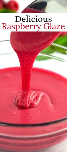 raspberry glaze is being poured into a glass bowl with the word delicious on it