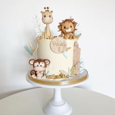 there is a cake decorated with animals on it