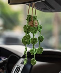 Add a touch of nature and charm to your car with our beautifully crafted Crochet Car Plant. Each piece is meticulously handmade with 100% natural cotton, creating a delightful and relaxing ambiance for drivers, especially on long and tiring journeys. Dimensions:- Hanging basket length: Approximately 7 inches (18 cm)- Pot width: 2.3 inches (6 cm)- Pot height: 2 inches (5 cm) This cute mini potted pendant isn't just a car accessory; it's a thoughtful gift that can brighten anyone's day. Perfect for girlfriends, friends, and family, it’s a lovely token of appreciation that can be given year-round. Enhance your car decor and bring a smile to your face every time you hit the road with this charming crochet car plant. Plant Crochet, Car Mirror Hanging Accessories, Car Hanging Accessories, Boho Car Accessories, Crochet Succulent, Crochet Hanging, Crochet Car, Rear View Mirror Accessories, Rear View Mirror Decor