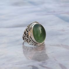 NOTE : WE USED NATURAL GEMSTONES , SO STONE MAY BE LITTLE DIFFERENT .This is a listing of Boho sterling silver ring # metal = sterling silver 925 # Gemstone - Green Jade # Ring Size - Available in all Size # Stone Color - Green # Stone Shape - Oval Handmade Crafting bohemian Ring - This style has bohemian style . it will look beautiful when you wear it .. Thanks for visiting our shop ... favorite our shop for daily updates ... Boho Statement Ring, Jade Rings, Green Onyx Stone, Bohemian Ring, Ring Hand, Bohemian Rings, Jade Ring, Ring Metal, Onyx Stone