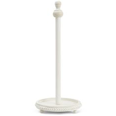 a white toilet brush and holder on a white background