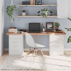 a white chair sitting in front of a wooden desk