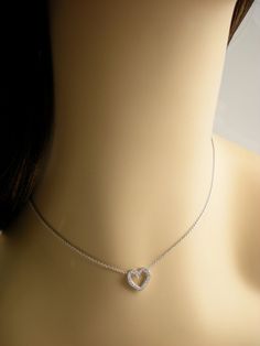 "This open heart pendent is 12.2 mm long and 12.3 mm wide it is set with 20 diamonds VS clarity and G color total weight .20cts. Heart is 18k and chain 14k total weight is approximately 3.3 grams. We love these pendent because it represents the way jewelry should be made with craftsmanship and quality. This pendent is anything but ordinary. Our pieces are designed and made with craftsmanship and sustainability in mind, our designs are made with handpicked fine quality gemstones and materials. Ea White Gold Heart Pendant Jewelry With Box Chain, Diamond Necklace With Box Chain For Gift, Elegant Diamond Necklace With Box Chain Gift, Elegant Heart Pendant Necklace With Box Chain, Elegant Heart Pendant With Box Chain, Elegant Heart Pendant Jewelry With Box Chain, Fine Jewelry Anniversary Diamond Necklace With Box Chain, Luxury Diamond Necklace With Box Chain For Gift, Elegant Hallmarked Necklace For Anniversary Gift