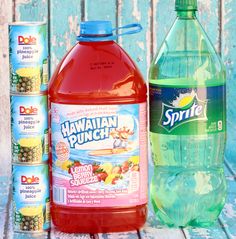 three bottles of hawaiian punch next to cans of sprite water and pineapple juice