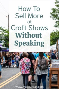 people walking down the street with text overlay how to sell more at craft shows without speaking