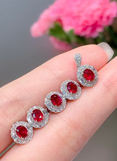 Model Number: REDAPGX028 18K white gold ruby stud earrings, classic style Metal Stamp: 18k Au750 Metals Type: 18K Gold Weight/g: 1.77 Stone: Material Rubyd/2pc and Weight/ct 0.65 Side Stone: Diamond/2 8pcs and Weight/ct 0.34 Metal Color: White Gold Setting Type: Prong Setting Gender: Unisex Fine