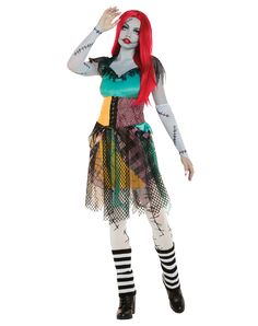 a woman with red hair and makeup is dressed up as a zombie girl, holding her hand out to the side