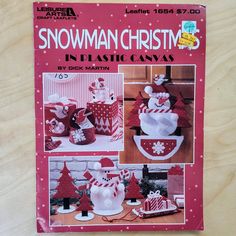 the front cover of snowman christmas in plastic canvass, with instructions for making it