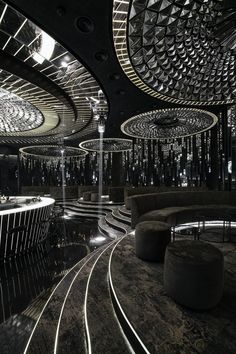 the interior of a fancy club with circular lights