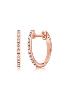 The classic diamond huggie gets a dainty delicate detail that breaks up the serenity of its sparkling stones. Crafted in 14K yellow, white or rose gold with .06ctw of round pave diamonds, these mini hoops offer a subtle sparkle and essential style. The design is so versatile you’ll want to reach for them every day. Available as a pair or a single. Diamond Huggie Earrings, Diamond Huggies, Single Rose, Mini Hoop Earrings, Initial Jewelry, Diamond Hoop Earrings, Huggie Hoop Earrings, Delicate Details, Huggies Earrings