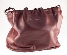 Céline Large Coulisse Shoulder Bag Burgundy Calf Leather Retail $2350 & Dust Bag Gorgeous Calf Leather Shoulder Bag by Celine From 2016 Collection by Phoebe Philo Features Calf Skin Exterior and Suede Interior Bag is in Good Used Condition. Some wear and wrinkling but no damage. Dust Bag Included. See photos for details. Appx 10.5" Wide, 13" Tall, 7.5" Deep Free US Shipping with Insurance Included. All items are professionally packaged and shipped. All shipments include insurance and delivery confirmation or signature confirmation. Local Pick-up is available in our showroom. (Contact us for payment methods to pay on pickup.)   International Shipping:  Worldwide Shipping at Buyer’s Expense  *The customs requirements for each country, including all import duties, taxes, and fees are the resp Phoebe Philo, Leather Shoulder Bag, Calf Leather, Calf Skin, Bags Handbags, Dust Bag, Shoe Accessories, Bag Lady, Women Accessories