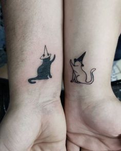 two people with matching tattoos on their arms