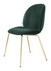 a green chair with gold legs on a white background