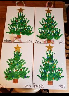 three handprinted christmas trees on white cards