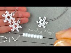 two white beads are being made into snowflakes on a string with the words diy next to them