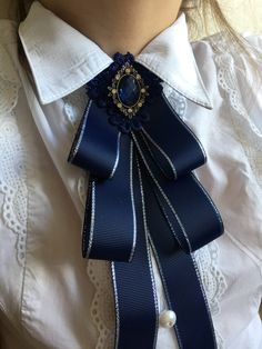 Elegant Blue Ribbon Bow, Gift Bow Brooch, Formal Bow Brooch, Classic Blue Brooches For Gifts, Formal Brooches With Satin Bow, Blue Bow Tie With Ribbon As A Gift, Formal Butterfly Knot Bow, Elegant Blue Bow As Gift, Classic Bow Brooches For Gift