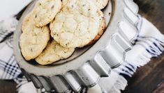 some cookies are in a metal pan on a table