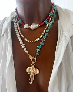 "Layered in Elegance 📿✨ Embracing the beauty of diverse styles with a mix of red, gold, turquoise, and a touch of charm with an elephant pendant. #JewelryLove #NecklaceLayers #StatementPieces #JewelryLove #AccessorizeInStyle #GlamGoals #Chokerset #handmadewithlove #necklaceoftheday #necklaceset #handmadejewelry #unique #trendy #instajewelry #choker #necklaceshop #AccessoiresColorés #StatementNecklace #FashionFun Diy Necklace Ideas, Beaded Jewelry Necklaces, Ankle Jewelry, Beaded Necklace Diy, Seashell Jewelry, Wear Necklaces, Unusual Jewelry, Elephant Pendant