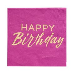 a pink napkin with the words happy birthday written on it and gold foil lettering,