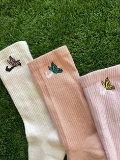 These butterfly socks are customized on crew socks. The butterfly embroidery has a black bodice with light color for detailing on the top of the sock. It is a simple butterfly that can add to any outfit. Based on the color way, these trendy socks can bring y2k energy with the bright spring colors. We've narrowed these 3 color ways for the butterfly embroidery crew socks to match any wearer, if you are interested in a different color story we can customize for you. MEDIUM SIZE (6-10 WOMEN, 6-8 ME Sock Embroidery, Butterfly Socks, Embroidery Socks, Aesthetic Socks, Embroidery Spring, Spring Embroidery, Embroidery Butterfly, Purple Socks, Embroidered Socks