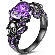 PRICES MAY VARY. 💍DESIGN: classic unique gothic skull design; Black gold plating makes it more stylish. Perfect for gothic, biker, punk, hip hop and rock style people. This is the perfect wedding ring to symbolize your love. 💍MATERIAL: metal made of high quality copper material. No nickel Lead, health and Anti-allergy.The main stone is made of high quality 5A cubic zirconia with a shining and charming effect, making it more eye-catching and comfort-fit. 💍OCCASIONS: suitable for various occasi Black Skull Ring, Skull Rings, Jewelry Purple, Black Skull, Party Rings, Vintage Gothic, Women Halloween, Black And Purple, Black Skulls