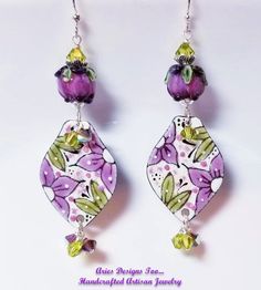 Handpainted Bohemian Floral Charm Earrings in Amethyst and Olive Green Bohemian Hand Painted Dangle Flower Earrings, Bohemian Hand Painted Purple Earrings, Purple Hand Painted Bohemian Earrings, Artistic Hand-painted Purple Earrings, Unique Hand Painted Purple Earrings, Artistic Hand Painted Purple Jewelry, Cloisonne Jewelry, Bali Silver, Bohemian Floral