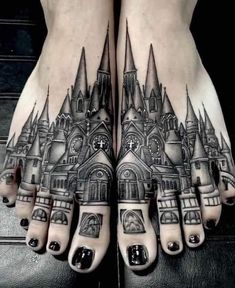 the feet are decorated with black and grey ink, while there is an image of a castle