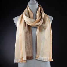 Our weavers in the Andean Quechua communities use centuries-old looms to create this striped alpaca scarf from one of nature's most versatile and renewable materials. Warmer than wool, this silky, hypoallergenic scarf is woven of 80% pure alpaca with 20% acrylic for resilience. Hand wash. 75'' x 11''. Tan And White Striped Scarf, Murano Glass Necklaces, Alpaca Scarf, Murano Glass Jewelry, Wool Caps, Kimono Dress, Silk Scarves, Winter Scarf, Womens Clothing Tops