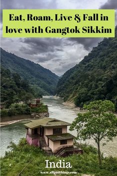 a house on the side of a river with text overlay reading eat, roam, live & fall in love with gangok skiin