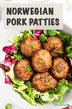 a white plate topped with meat patties and lettuce