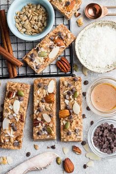 healthy granola bars with nuts, almonds and chocolate chips on a cooling rack