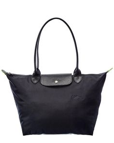 Women's Longchamp Le Pliage Green Nylon Bag - Black - Totes About the brand: Understated luxury leather goods with a French elegance. Made in Italy. Le Pliage Green Nylon Bag in black nylon with foldable design. Measures 10.43in wide x 11.02in high x 6.1in deep. Zipper closure. Please note: All measurements were taken by hand and are approximate; slight variations may occur. Our products are 100% genuine. In some cases we purchase merchandise from trusted independent suppliers and not directly f Luxury Packable Bags For On-the-go, Versatile Foldable Shoulder Bag For On-the-go, Modern Travel Shoulder Bag Packable, Modern Packable Shoulder Bag For Travel, Modern Foldable Bag For Everyday, Versatile Black Foldable Shoulder Bag, Travel Foldable Tote Shoulder Bag, Foldable Tote Shoulder Bag For Travel, Black Foldable Shoulder Bag For Travel