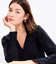 In a soft jersey knit, our modern bow blouse is softly shirred and cinched with a tie neck for an irresistibly feminine twist. V-neck with ties. Long sleeves with pleated button cuffs. Back yoke. Shirttail hem.,Bullet1:25 1/2" long,Imported:Imported,Fit:Fit: Classic — follows your contours with a little room,Length:Length: Regular - hits below natural waist,Fabrication:92% Lyocell 8% Spandex,Garment Care:Machine Washable Loft Jersey Bow Blouse Size XS Black Women's by Loft Size Regular - XS Blac Scarf Sale, Grey Outfit, Bow Blouse, Blouse Tops, Blazer With Jeans, Petite Tops, Sweater Sale, Dress With Cardigan, Pant Shirt