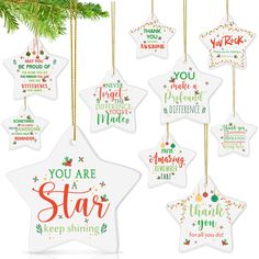 christmas ornaments hanging from a tree with the words you are star on them